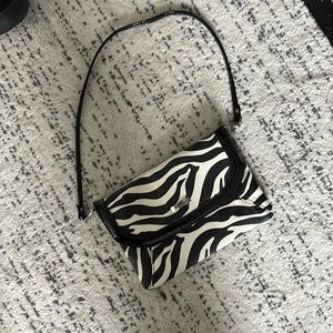 Grace Adele zebra clutch